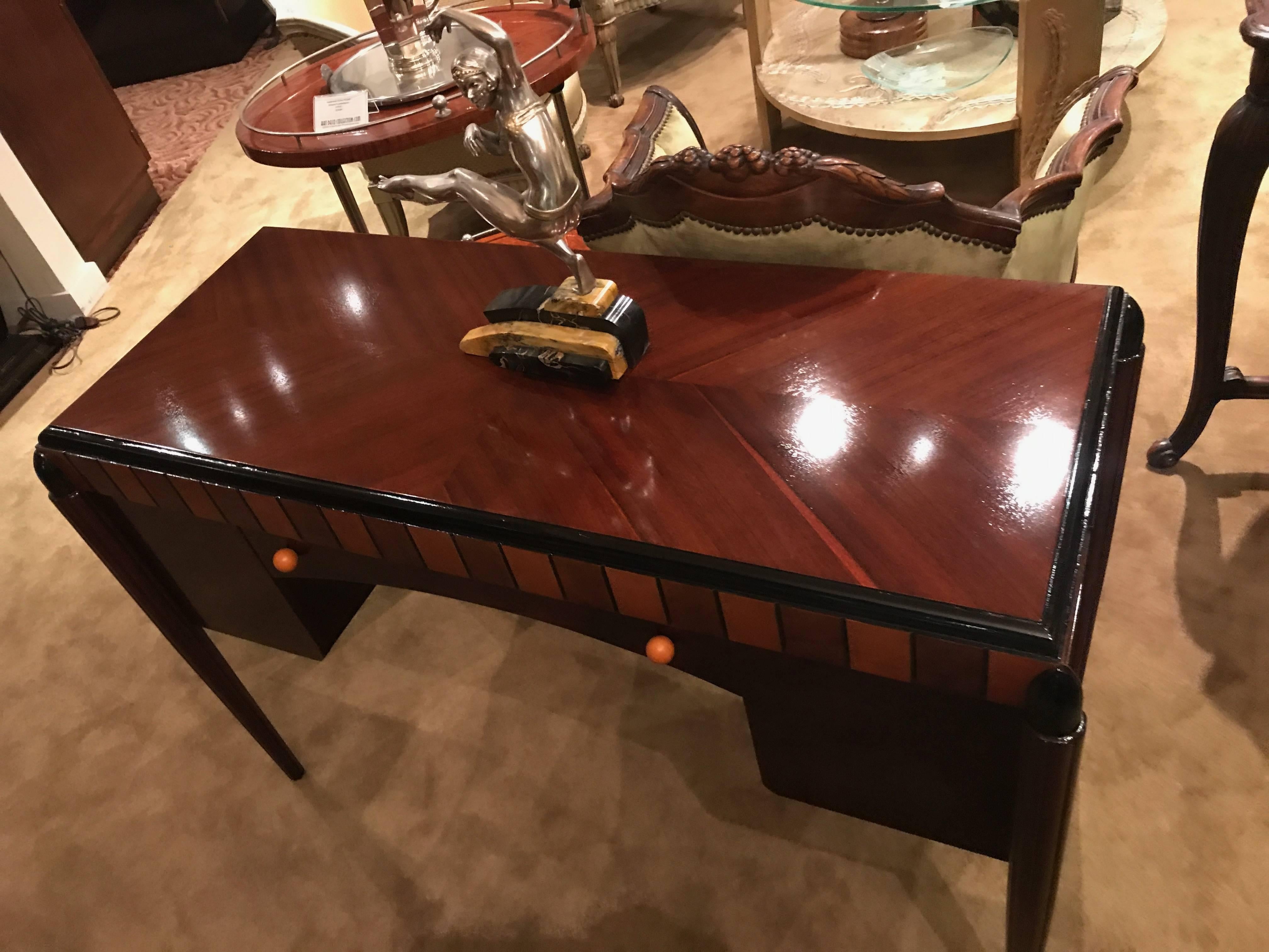 If you were every looking for a highly stylized French Art Deco writing table, I think this may be one of the nicest original pieces I've seen in a long time. The size is wonderful and very useful as a desk, writing table, reception table or small