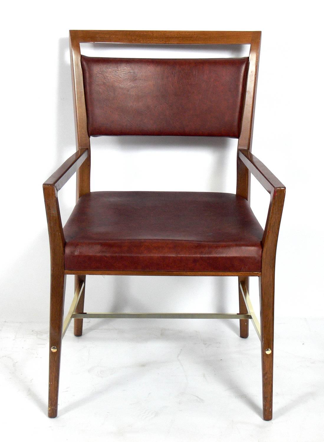 Set of 12 dining chairs, designed by Paul McCobb, American, circa 1950s. These chairs are currently being refinished and reupholstered and can be completed in your choice of finish color and reupholstered in your fabric. The price noted below
