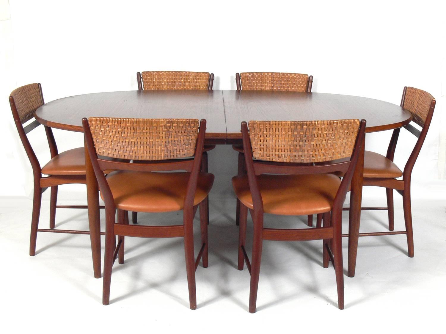 Mid-20th Century Danish Modern Teak Dining Table Seats 6-12