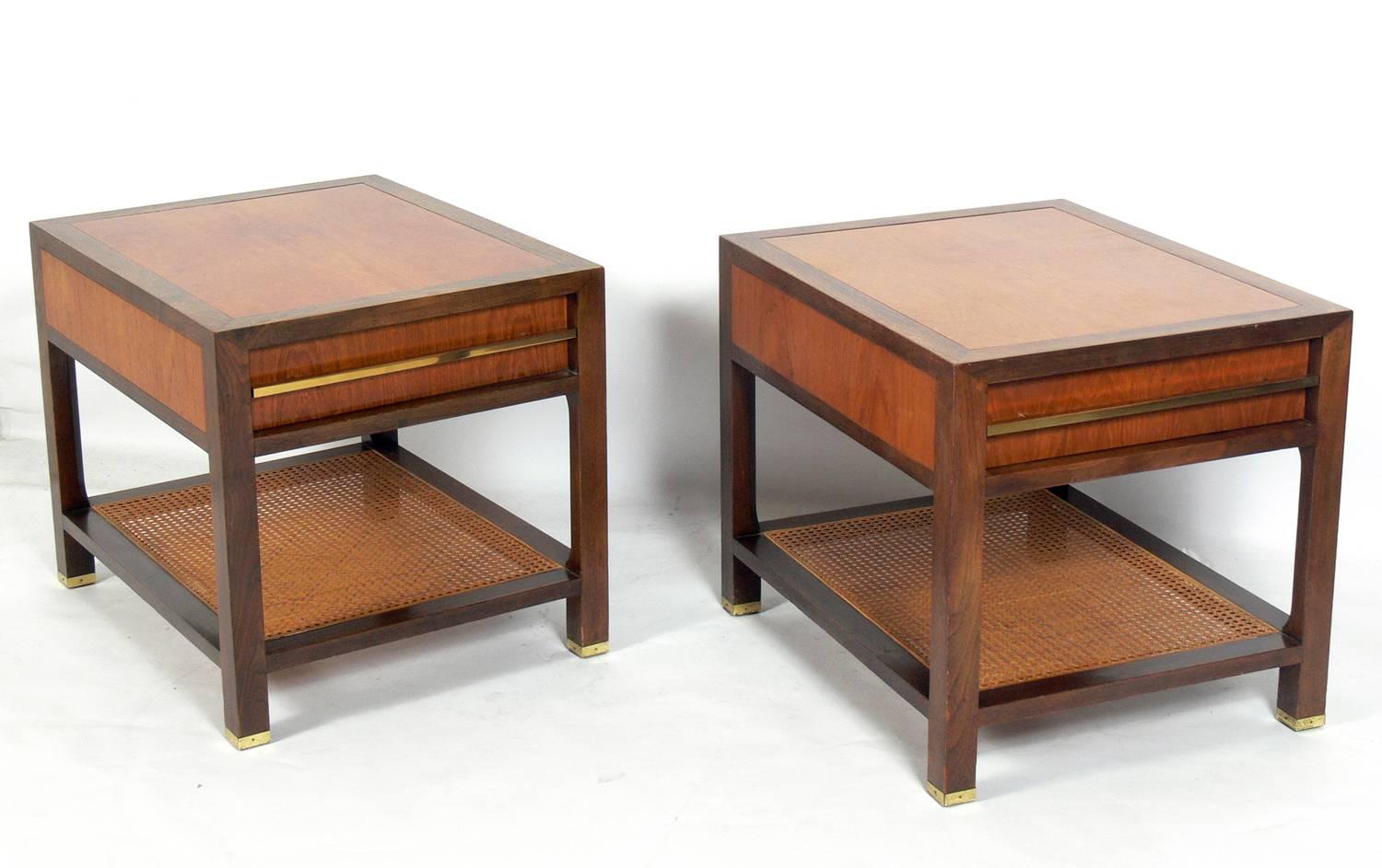 Pair of clean lined end tables, designed by Michael Taylor for Baker, American, circa 1960s. They are a versatile size and can be used as side or end tables in a living area, or as nightstands in a bedroom.