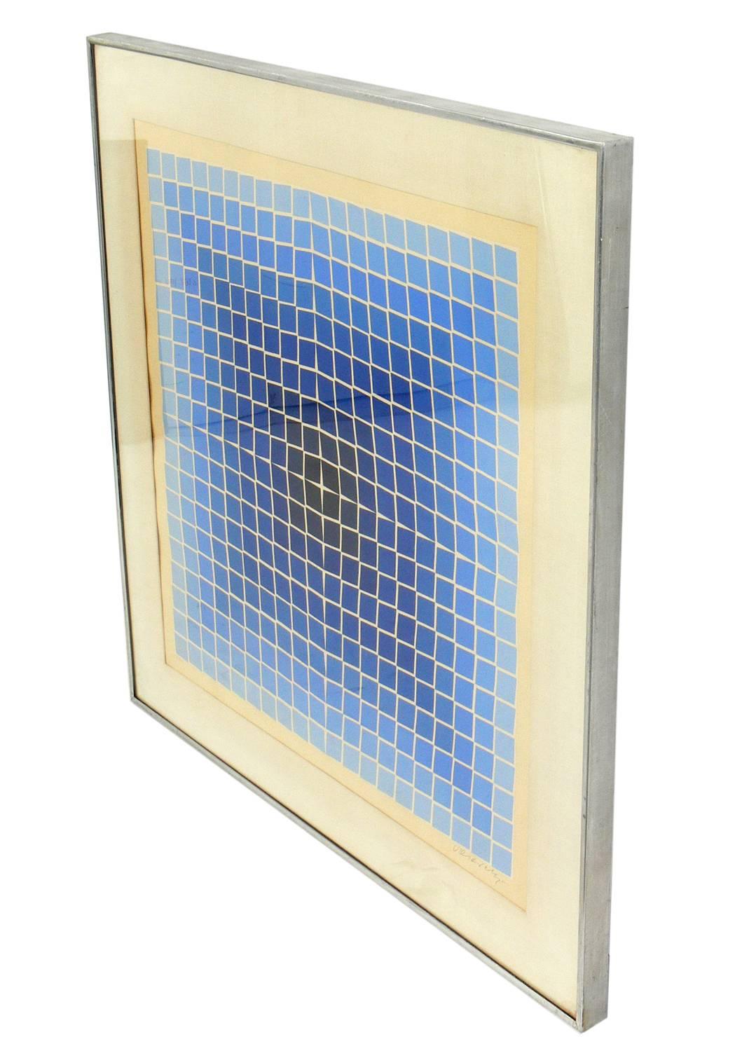 Colorful geometric lithograph by Victor Vasarely, for Denise Rene Editeur, France, circa 1960s. This work is pencil signed and numbered 93 from a limited edition of only 200. Framed in it's original frame.