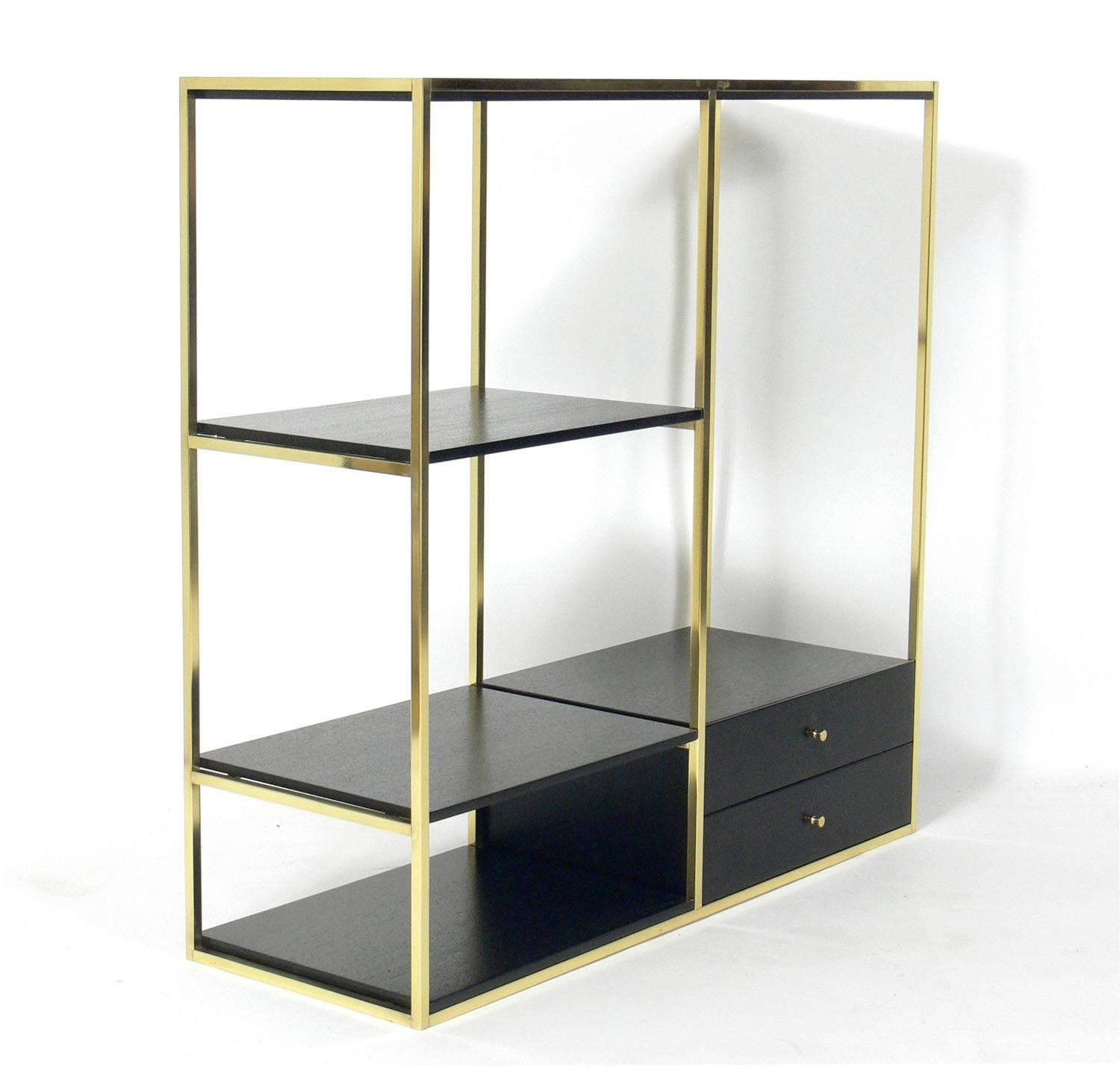 Mid-Century Modern vitrine shelves, designed by Paul McCobb for Calvin, American, circa 1950s. They have been completely restored in an ultra deep brown color with the brass hardware polished and lacquered. They are a versatile size and can be used