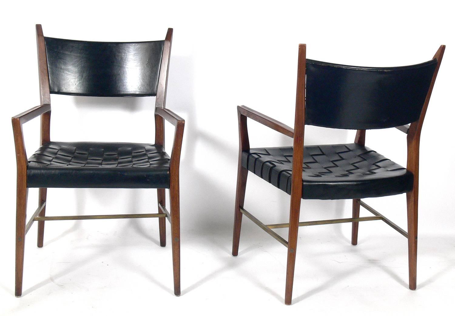 Mid-Century Modern Set of Four Black Leather Walnut and Brass Dining Chairs by Paul McCobb