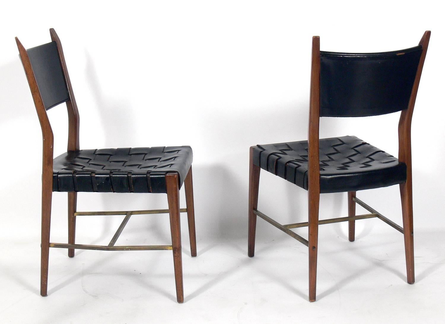 Set of Four Black Leather Walnut and Brass Dining Chairs by Paul McCobb In Good Condition In Atlanta, GA