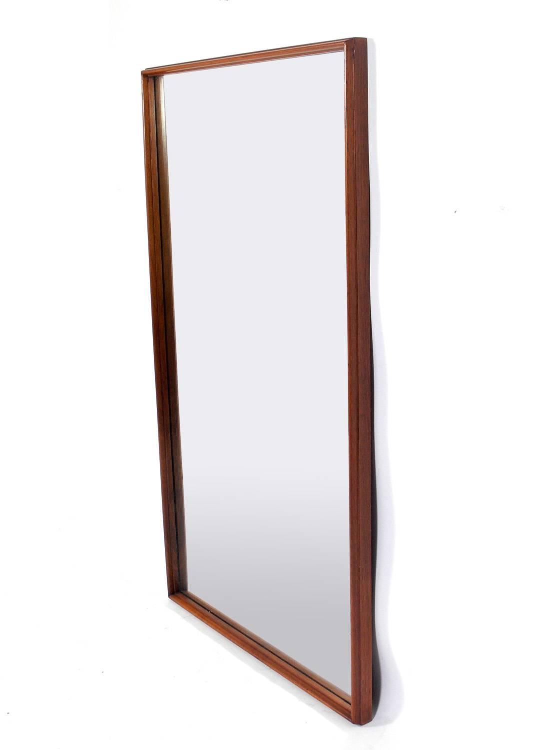 Clean lined modern mirror, designed by T.H. Robsjohn-Gibbings for Widdicomb, circa 1950s. This piece is currently being refinished and can be finished in your choice of color. The price listed includes refinishing.