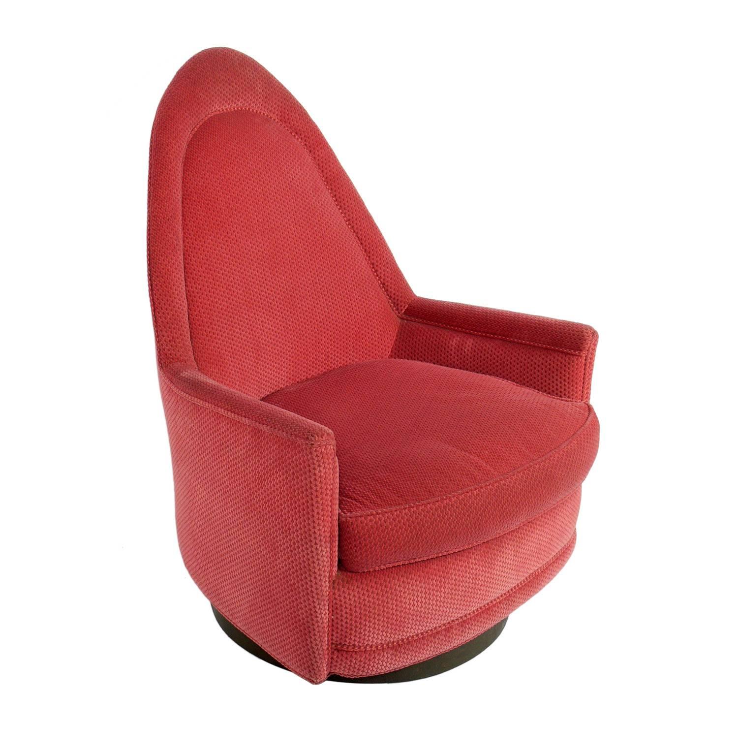 Curvaceous swivel chair, designed by Milo Baughman for Thayer Coggin, American, circa 1960s. This chair is currently being reupholstered and refinished and can be completed in your choice of finish color and reupholstered in your fabric. The price