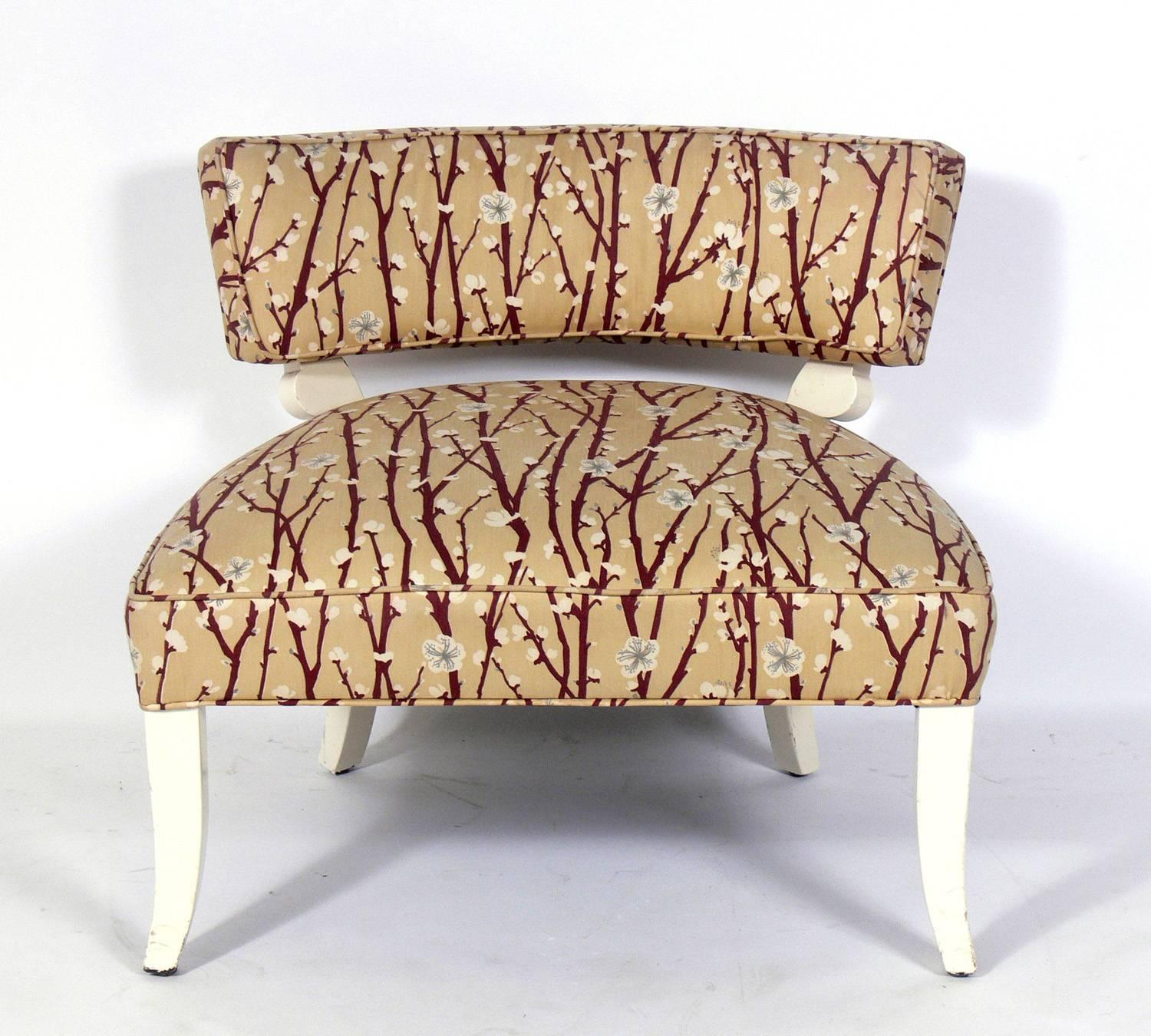 Pair of elegant slipper chairs in the manner of Billy Haines, American, circa 1940s. These chairs are currently being refinished and reupholstered and can be completed in your choice of finish color and in your fabric. The price noted below includes