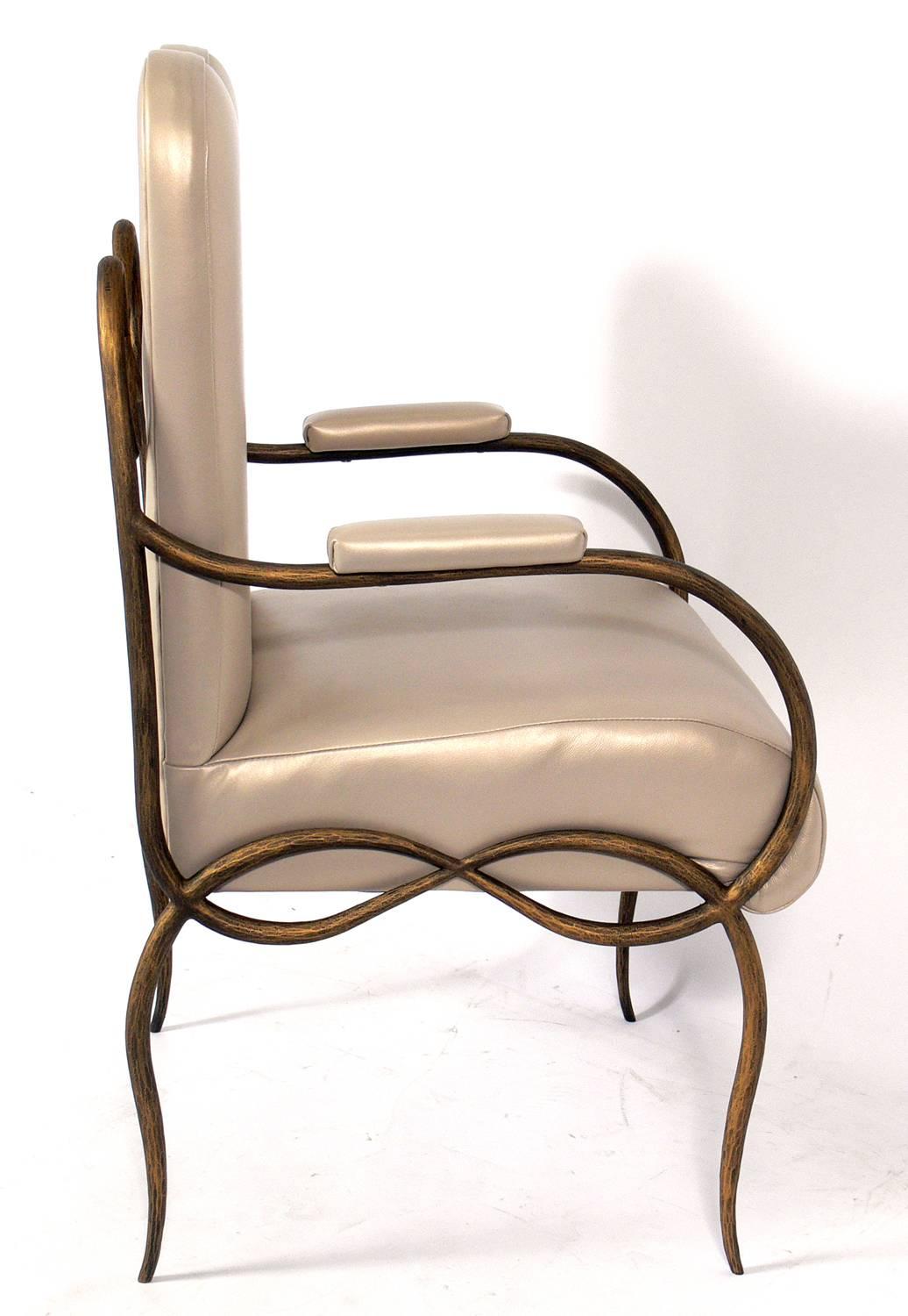 Gilt iron and leather chair after René Drouet, French, circa 2000s. It has been upholstered in a pearlescent leather.