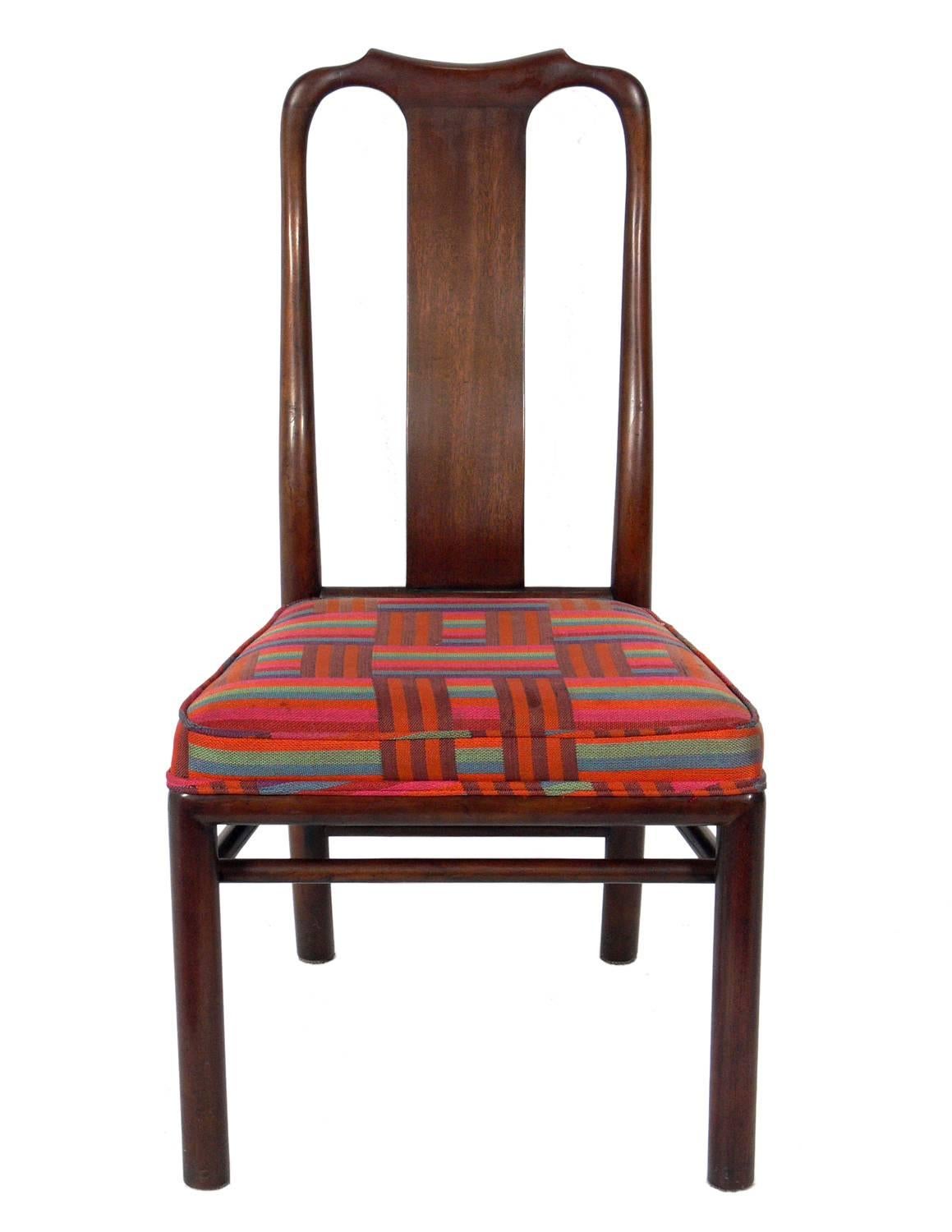 Set of eight dining chairs with subtle Asian influence, designed by Michael Taylor for Baker, American, circa 1960s. These chairs are currently being refinished and reupholstered and can be completed in your choice of finish color and your fabric.