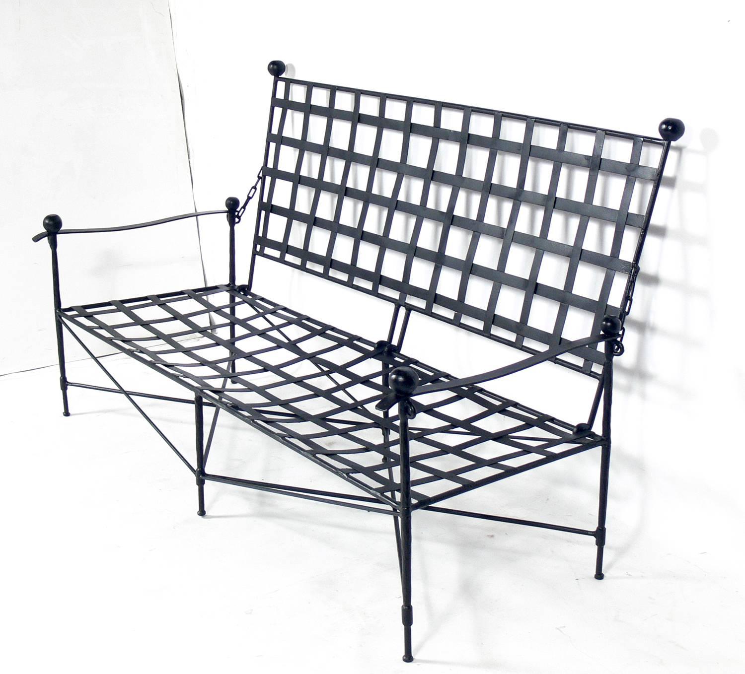 Sculptural iron patio set, in the style of Mario Papperzini, Italian, circa 1950s. This is a versatile form and it can be used indoors or outdoors. This sculptural chair design was used by Yves Saint Laurent in his personal residence at la Rue de