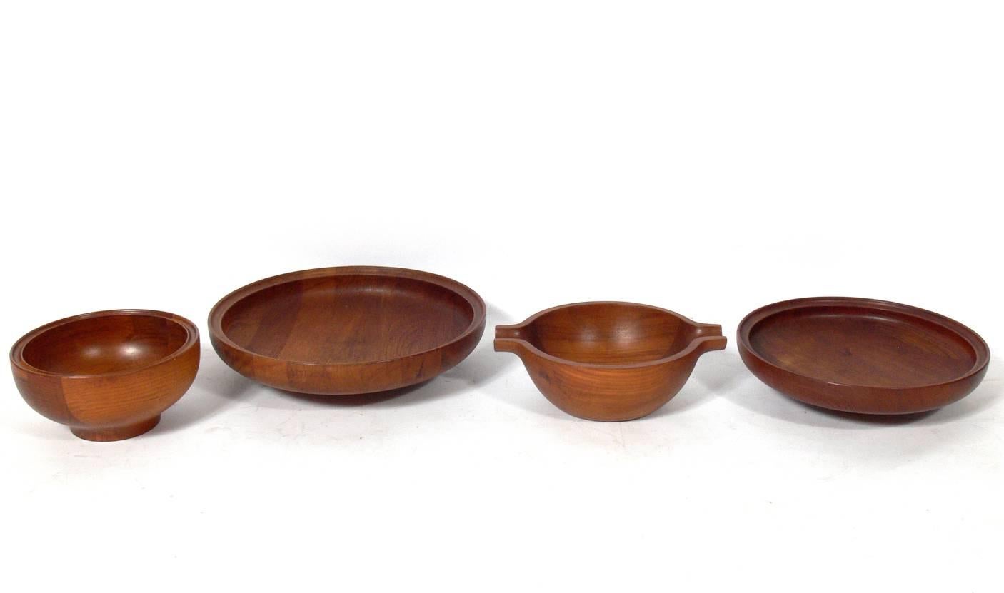 Collection of Danish modern centerpiece bowls by Henning Koppel for Georg Jensen, Denmark, circa 1960s. The top left bowl measures 4.