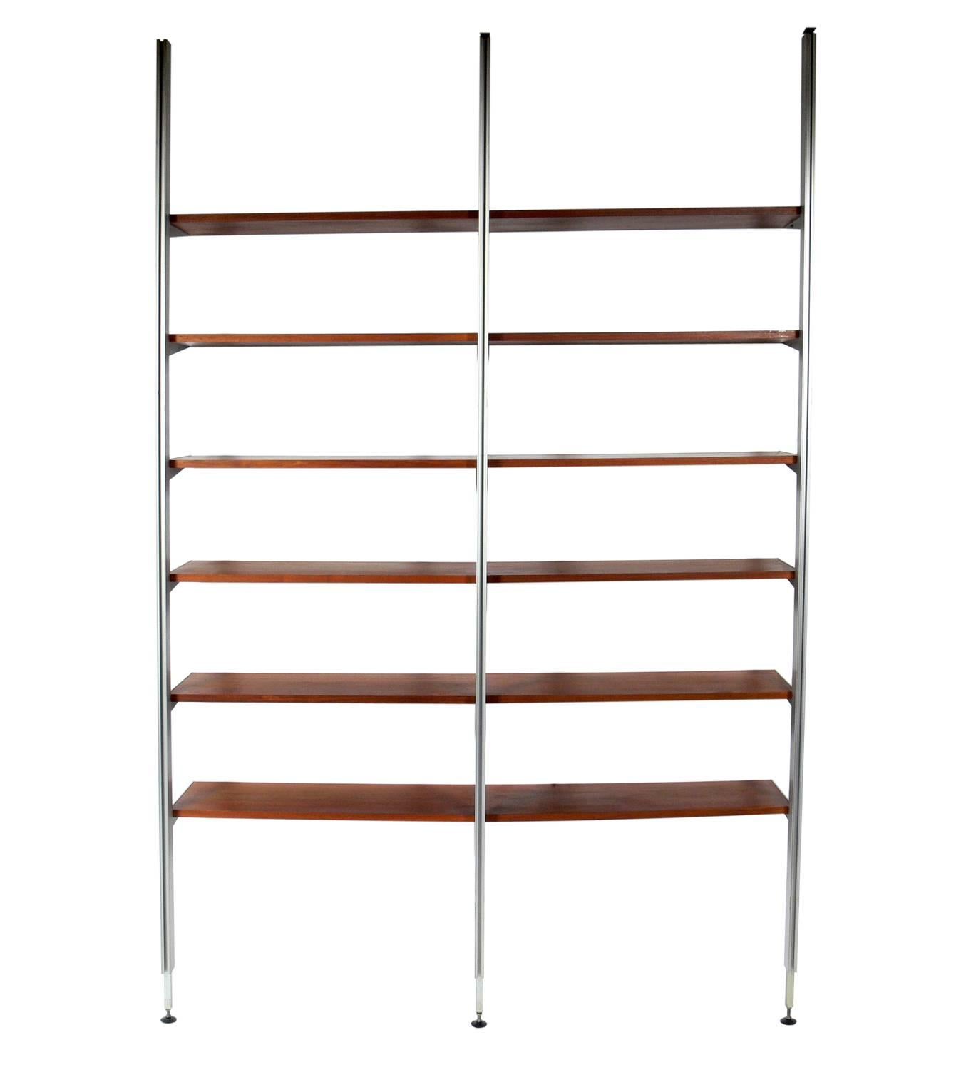 George Nelson for Herman Miller CSS Bookshelf Unit, American, circa 1950s. This unit contains three uprights for two bays and a total of twelve shelves, which can be configured anywhere you like up and down the uprights. Perfect as a stand alone