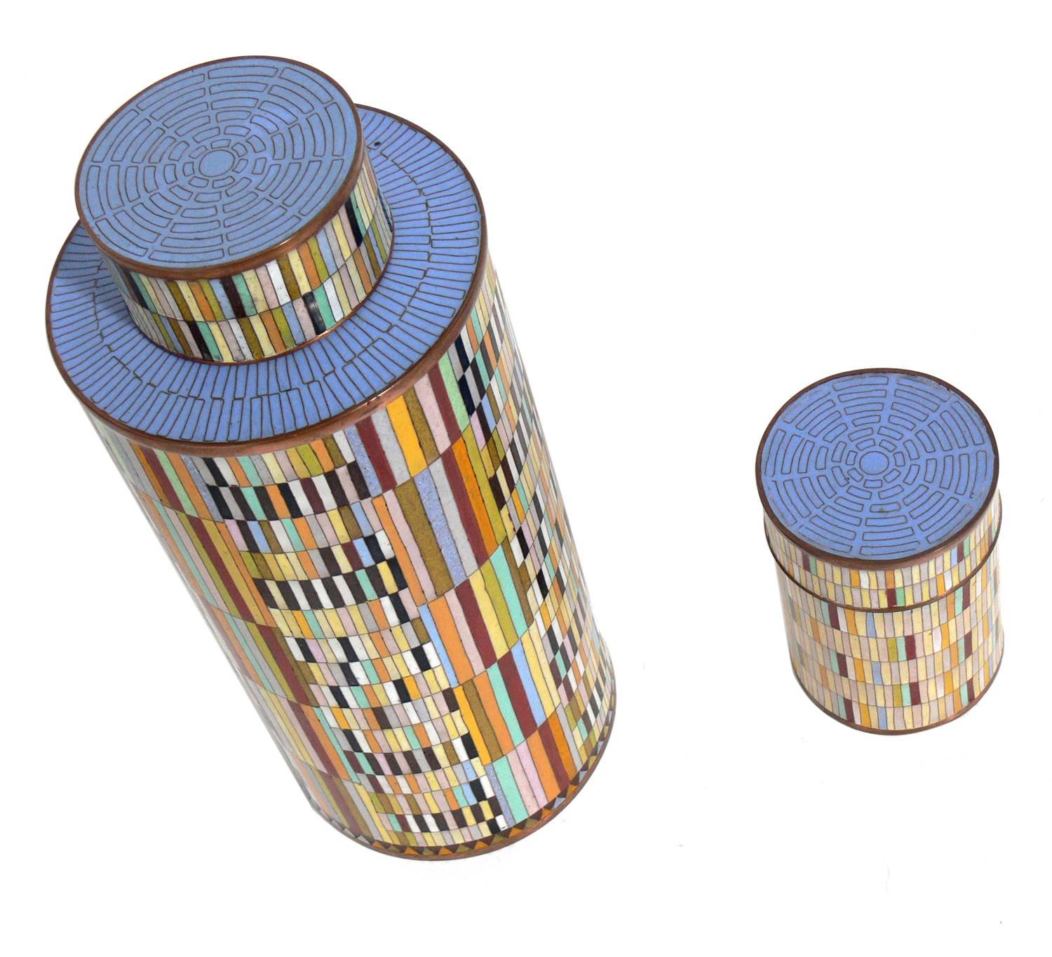 Pair of colorful Cloisonne canisters by Fabienne Jouvin, French, circa 1990s. The taller canister measures 13.5