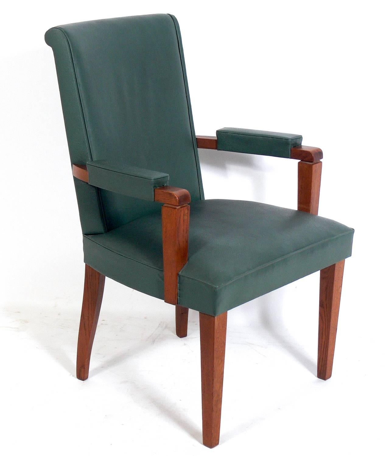 Set of Six French Art Deco oak dining chairs, in the manner of Andre Arbus, French, circa 1940s. These chairs are currently being reupholstered, as one chair has significant wear to it's upholstery. The priced noted below includes reupholstery in