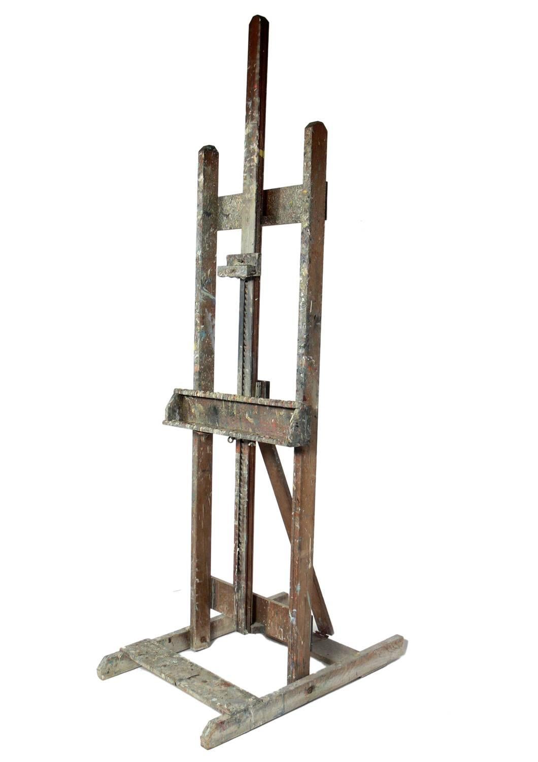 Vintage Artist's Easel, American, circa 1950s. This easel is a versatile piece and can be used for it's intended purpose, as an easel, or to display a work of art, or hold a flat screen television. The easel retains it's wonderful original patina