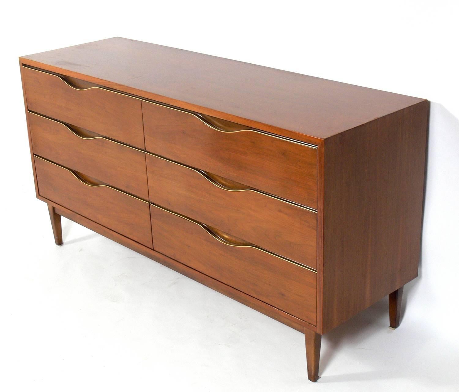 Midcentury Walnut Chest or Dresser with Brass Trim, American, circa 1960s. This chest is currently being refinished and can be completed in your choice of color, including the walnut color currently seen, or an ultra dark brown as seen in the last