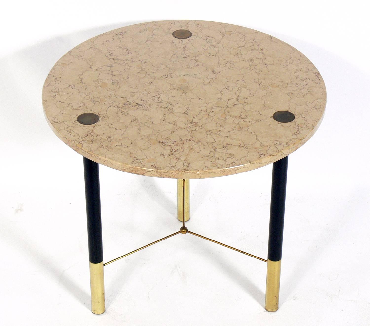 Elegant marble and brass table, American, circa 1960s. It is a versatile size and can be used as an end or side table, centre table or nightstand. This was originally a lamp table, but the lamp hole in the marble has been filled.