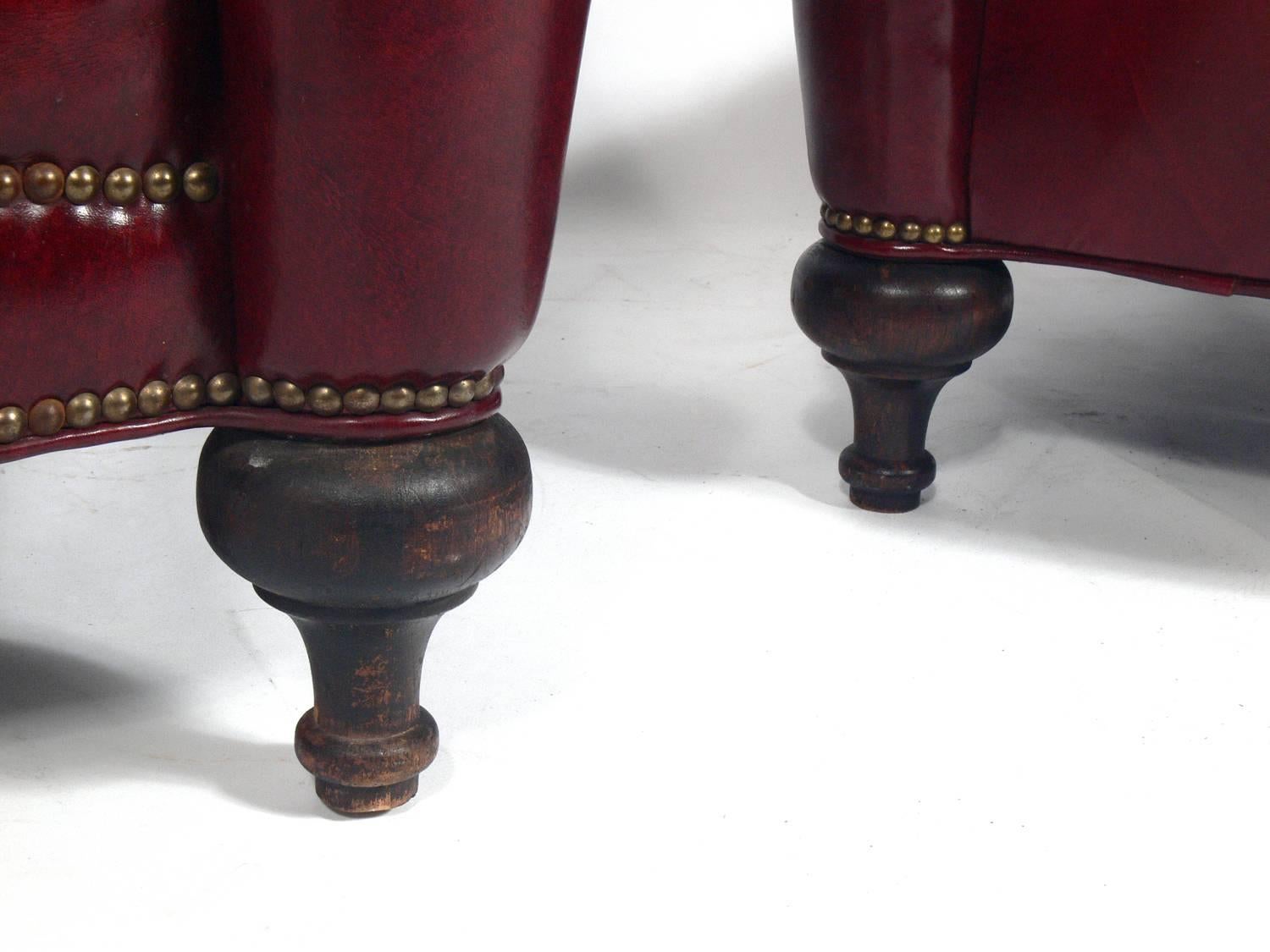 Brass Pair of Tufted Oxblood Red Leather Club Chairs 