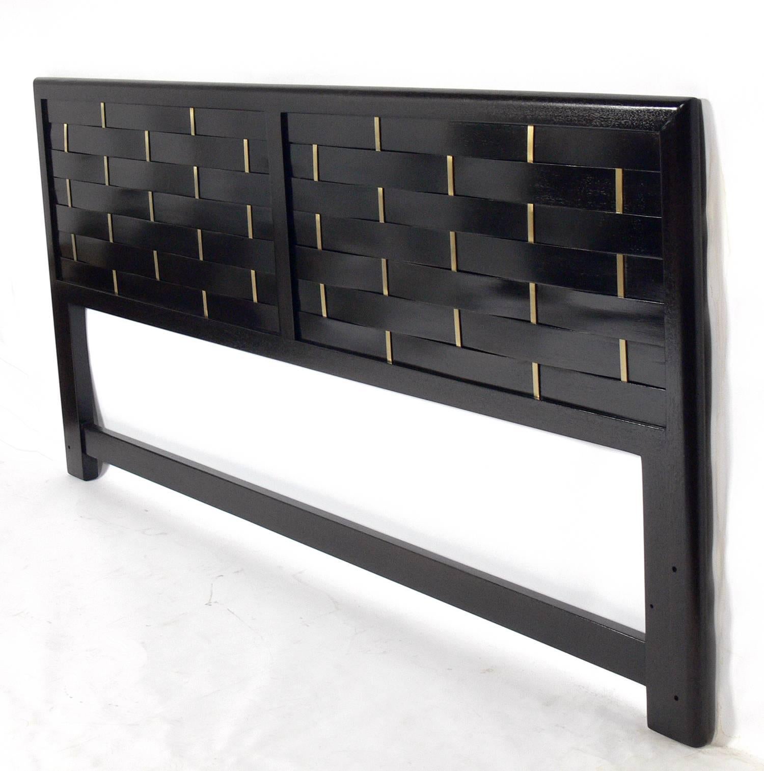 Modernist woven lacquered wood and brass headboard, designed by Harvey Probber, American, circa 1960s. This piece has been refinished. It measures 80