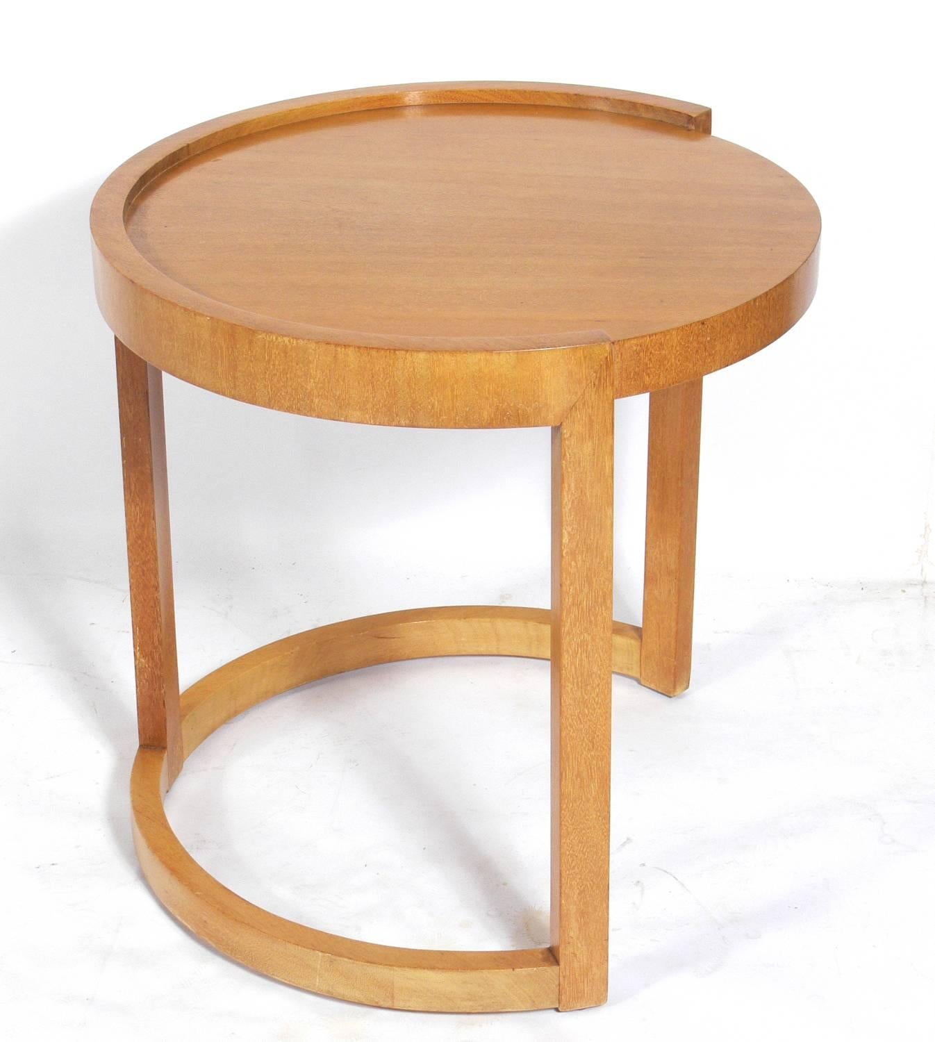 Sculptural end or center table by Paul Laszlo for Brown Saltman, American, circa 1950s. Signed with manufacturer and designers signature label underneath. It is a generous size and can be used as an end or side table, or as a nightstand or center