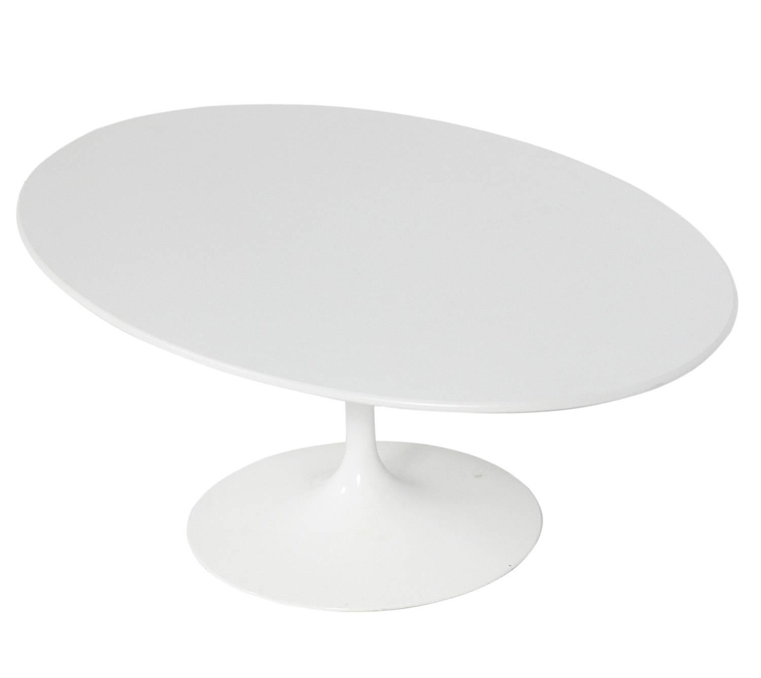Oval Tulip coffee table, designed by Eero Saarinen for Knoll, Italian, originally designed in 1957, this example is circa 2000s production. It was purchased for the Art Basel show in Miami and was only used for the show. Marked with Knoll label