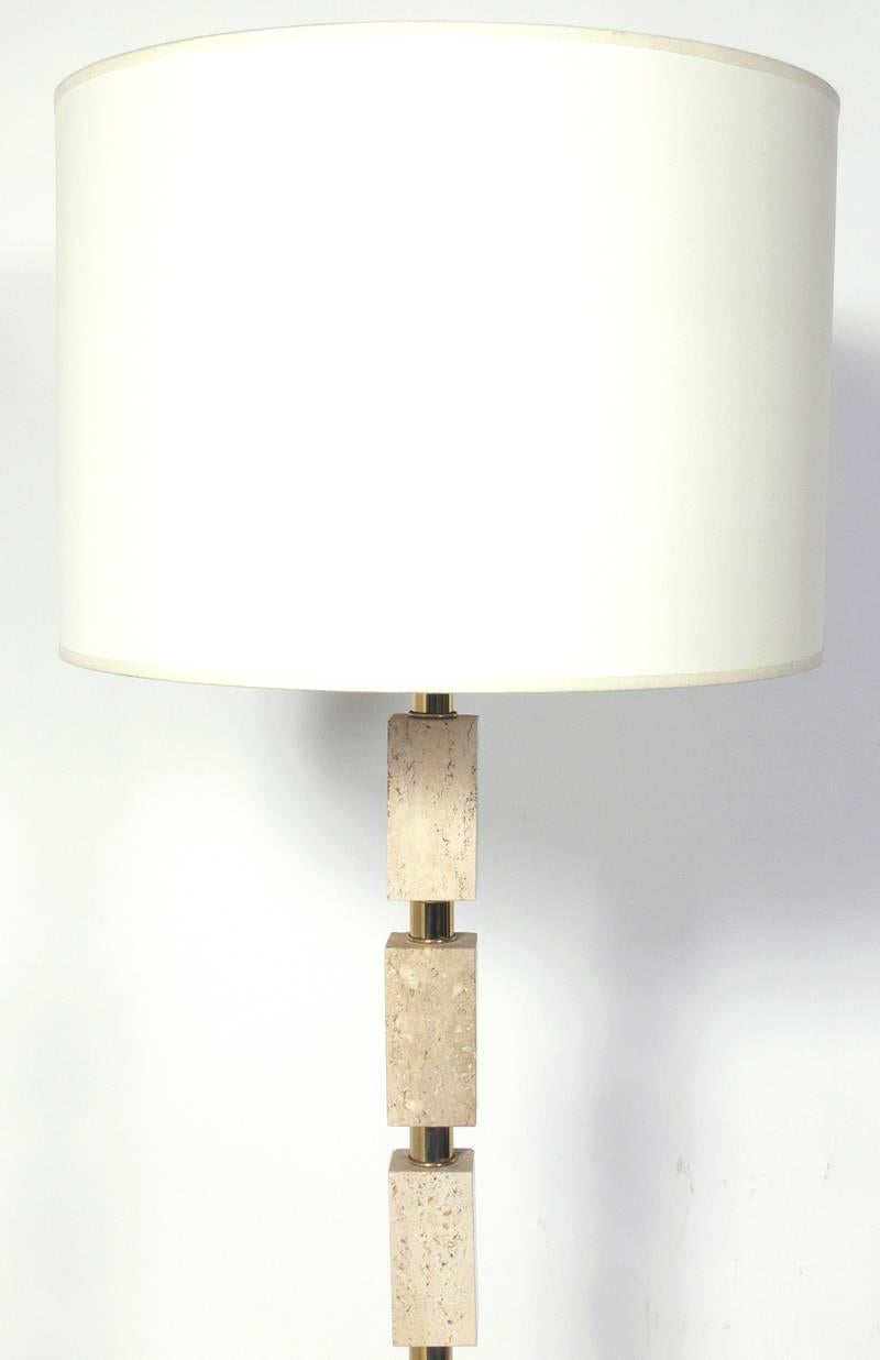 Elegant Travertine and Brass Floor Lamp, American, circa 1960's. The price noted below includes the shade. It has been rewired and is ready to use.