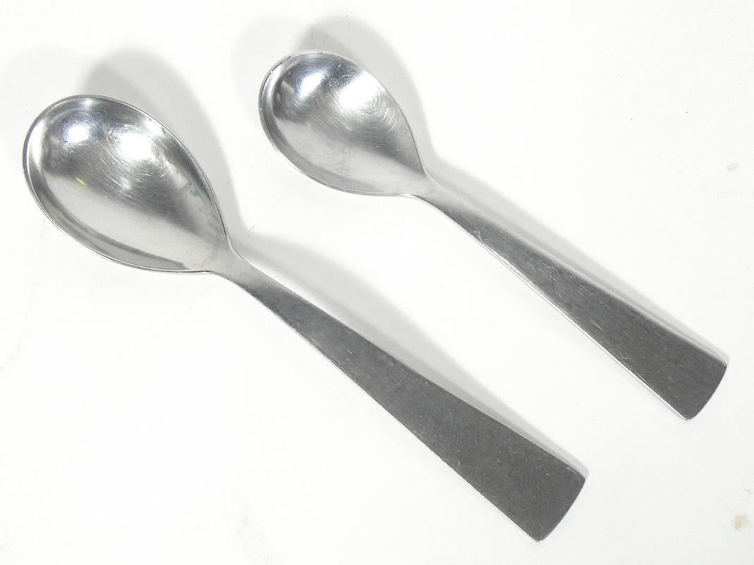 Modernist Flatware Set, designed by Gio Ponti for Arthur Krupp of Italy, and imported by Fraser's, circa 1954. This is a five piece service for twelve people, 60 pieces total. It is constructed of high quality stainless steel and is safe for