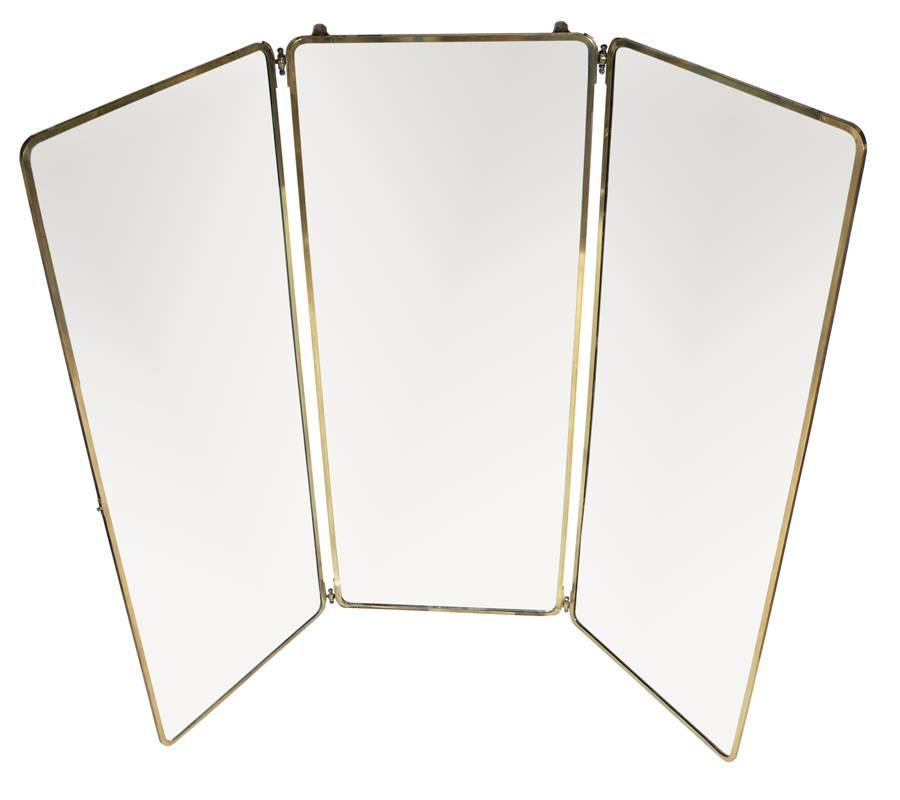 Incredible Full Length Brass Folding Mirror, probably French, circa 1930's. Very rare to find in this size and condition. A perfect addition to your dressing room or walk in closet, or equally at home in a chic boutique. It measures an impressive