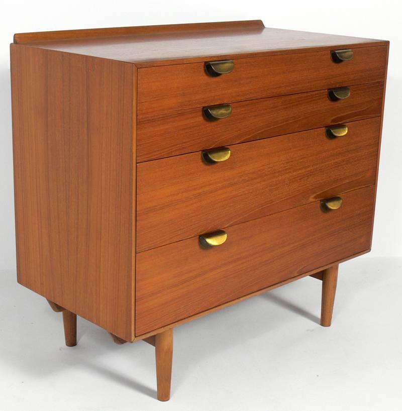 Pair of Danish modern style chests or dressers, designed by Finn Juhl for Baker, American, circa 1952. These pieces are part of a rare line that Finn Juhl designed for Baker for only one year in 1952. They are currently being refinished. The price