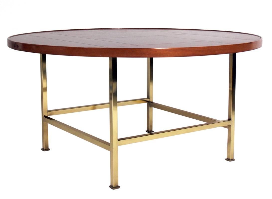 Modernist Walnut and Brass Coffee Table, designed by Edward Wormley for Dunbar, Model Number 5648, unsigned, American, circa 1960's. The brass base has been polished and lacquered. 