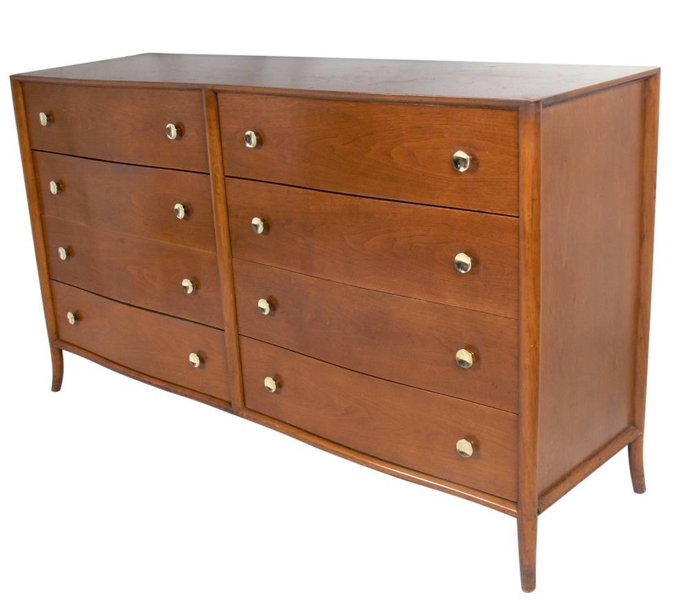 Large Scale Chest designed by T.H. Robsjohn Gibbings for Widdicomb, circa 1950's. This piece offers a voluminous amount of storage with eight deep drawers. It is currently being refinished and can be completed in your choice of color. The price