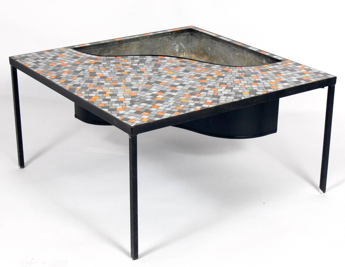 Mosaic tile coffee table, American, circa 1950s. The family that we purchased this from said that most of the year they kept potted plants inside the inset inclosure. But during big summer parties, they would remove the plants, fill it with ice, and