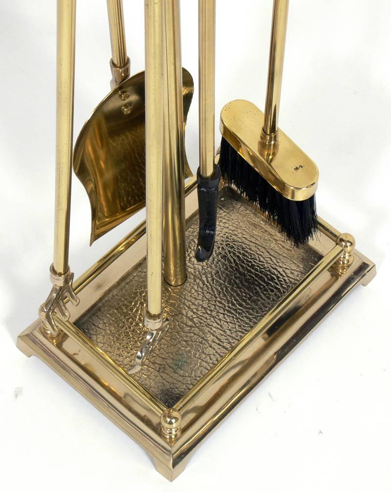 Mid-20th Century Elegant Brass Scroll Andirons and Fire Tools