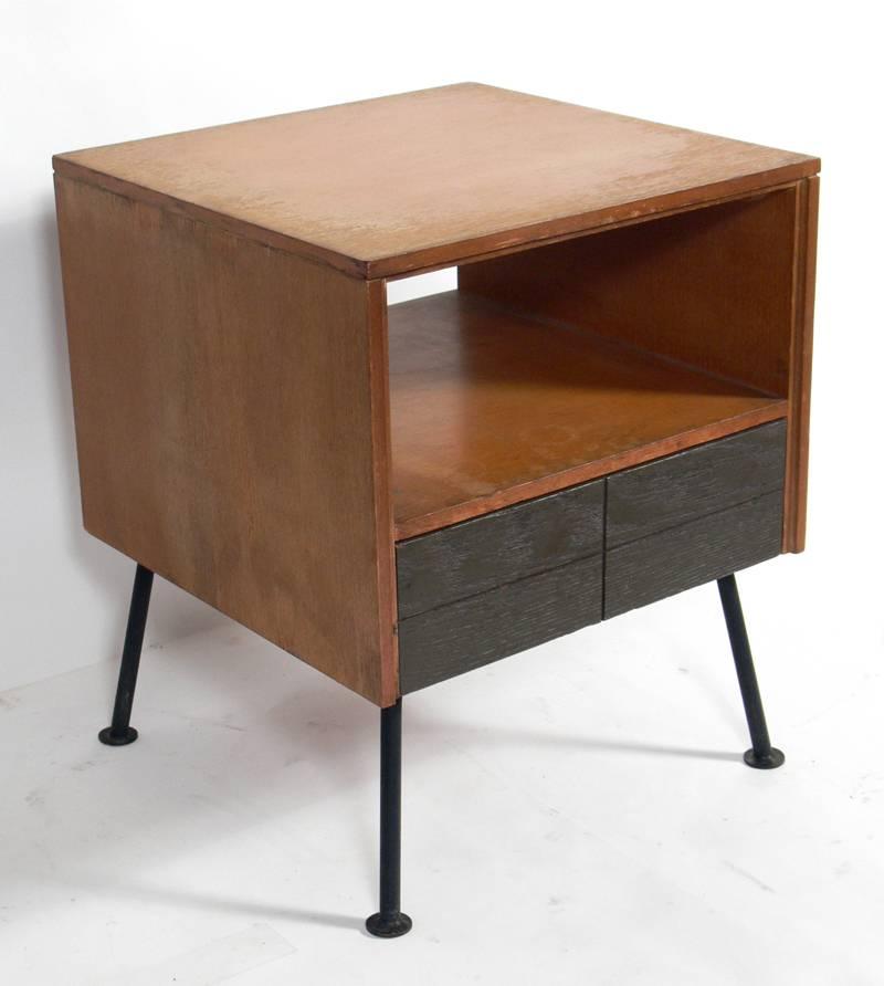 Pair of clean lined nightstands or end tables, designed by Raymond Loewy for Mengel, circa 1950s. They are currently being refinished and can be completed in your choice of color. The price noted below includes refinishing in your choice of color.