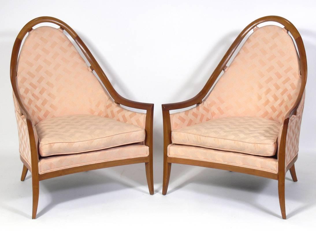 Pair of sculptural arch back chairs designed in the style of Harvey Probber, American, circa 1960s. These chairs are currently being reupholstered and refinished. The price noted below includes refinishing in your choice of color and reupholstery in