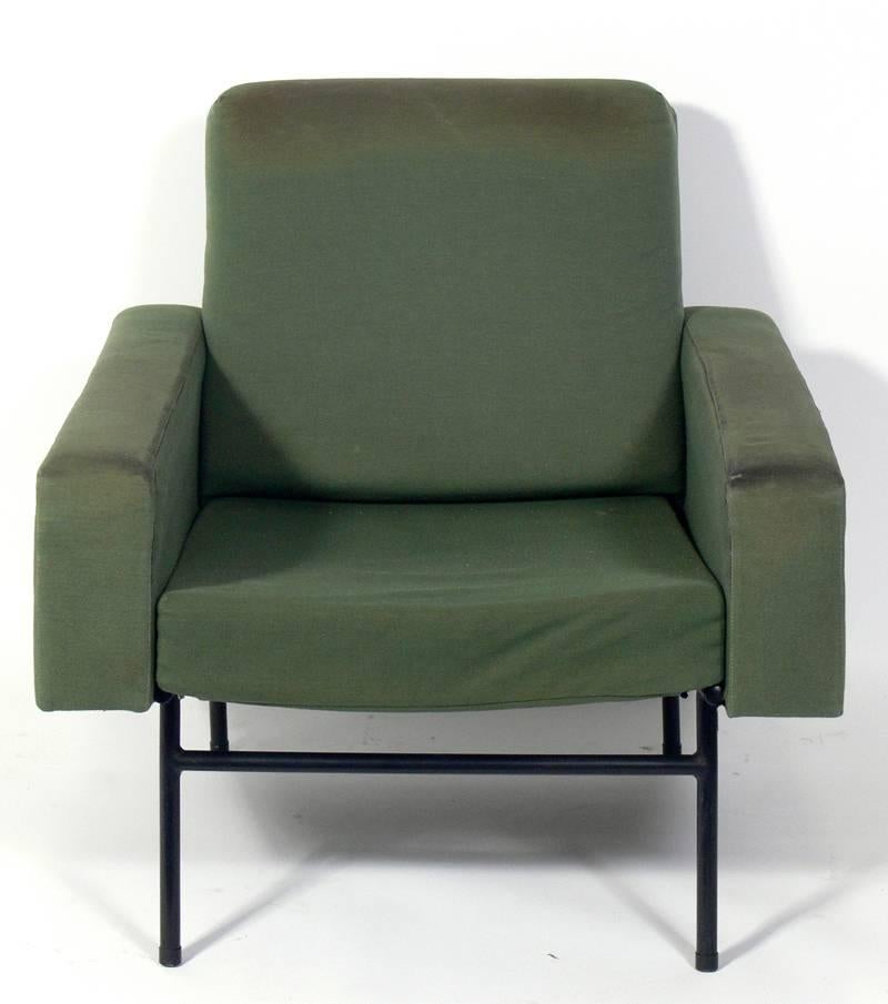 Pair of Modern lounge chairs, designed by Pierre Guariche for Airborne International, France, circa 1950s. These chairs are currently being reupholstered. The price noted below includes reupholstery in your fabric.