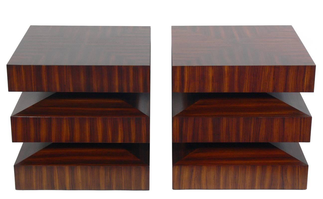 Pair of sculptural zebra wood end tables, American, circa 1990s. Beautifully bookmatched tables with incredible graining to the wood. These tables are a versatile size and can be used as side or end tables, or as nightstands. The price noted below