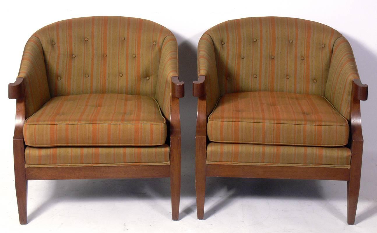 Pair of glamorous lounge chairs by Henredon, American, circa 1960s. These chairs are currently being refinished and reupholstered. The price noted below includes refinishing in your choice of color and reupholstery in your fabric. We have two pair