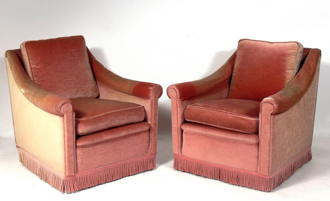 Pair of curvaceous Belgian Art Deco lounge chairs, designed by Gustave Creyel, Belgium, circa 1940s. These chairs are currently being reupholstered and can be completed in your fabric. The price noted below includes reupholstery in your fabric.