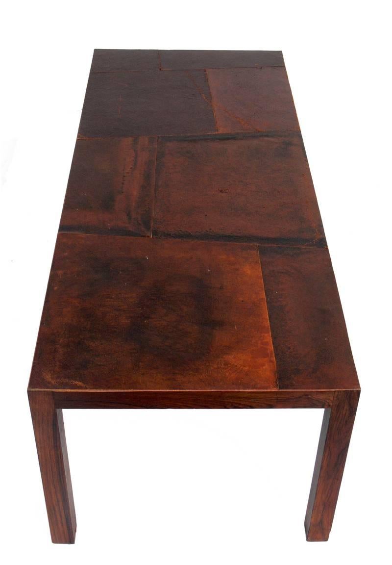 Mid-20th Century Danish Modern Rosewood Coffee Table with Patinated Leather Top For Sale