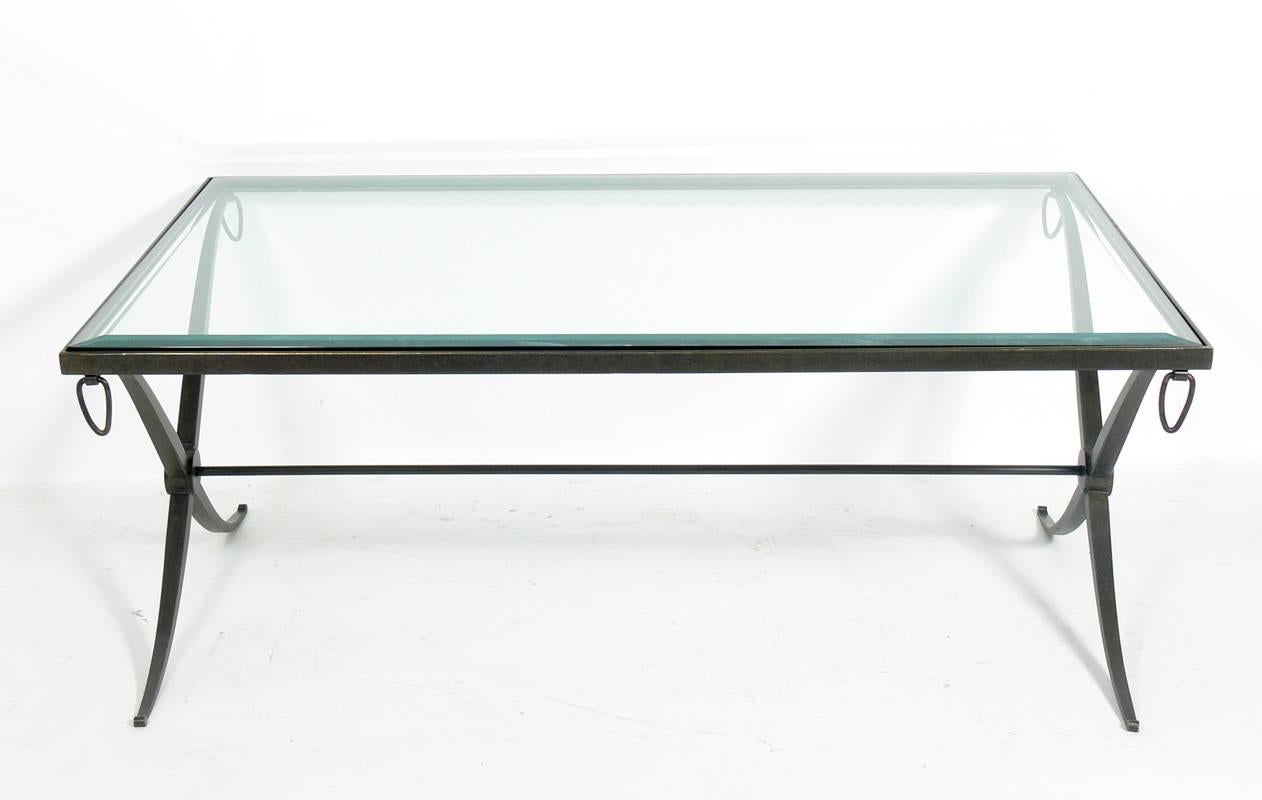 Curvaceous X-base bronze coffee table, American, circa 1990s. The bronze retains it's warm original patina.