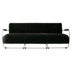 Canapé Art déco Warren McArthur, vers les années 1930, design aérodynamique en aluminium, retapissé, 89"