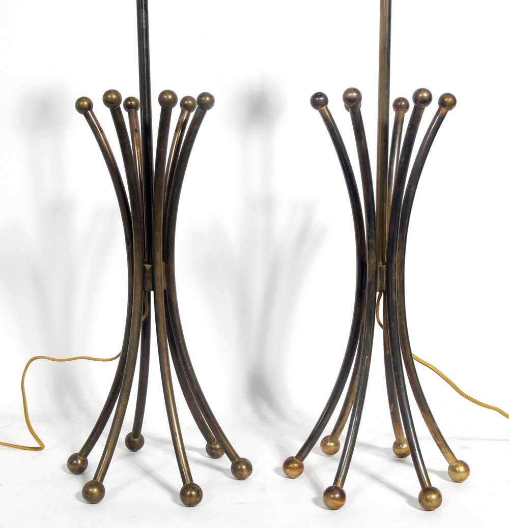 Sculptural bronze lamps in the manner of Jean Royère, French, circa 1960s. They have been rewired and are ready to use. The price noted below includes the shades.