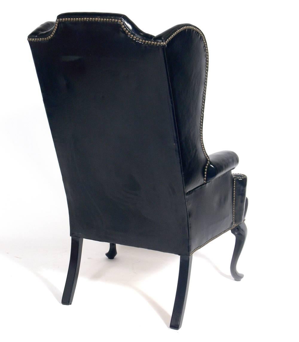 Lacquered Perfectly Patinated Black Leather Wing Chair