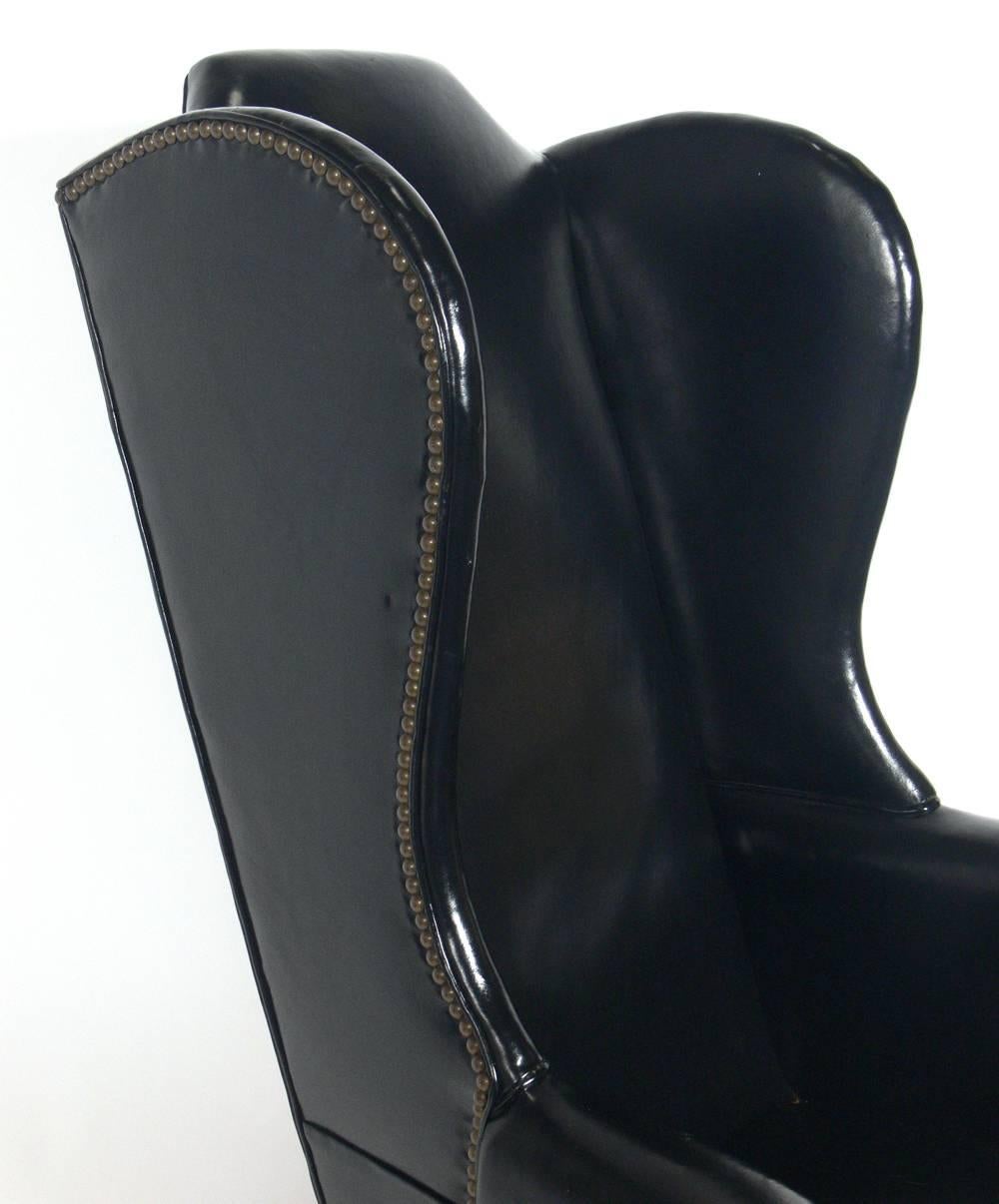 Perfectly Patinated Black Leather Wing Chair In Good Condition In Atlanta, GA