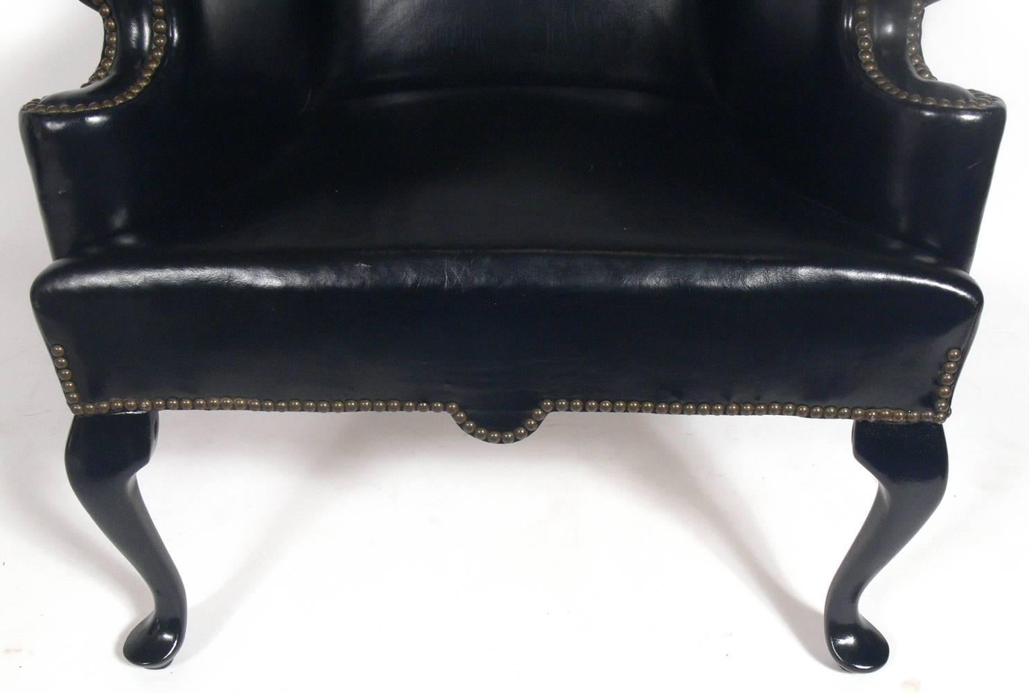 Mid-20th Century Perfectly Patinated Black Leather Wing Chair
