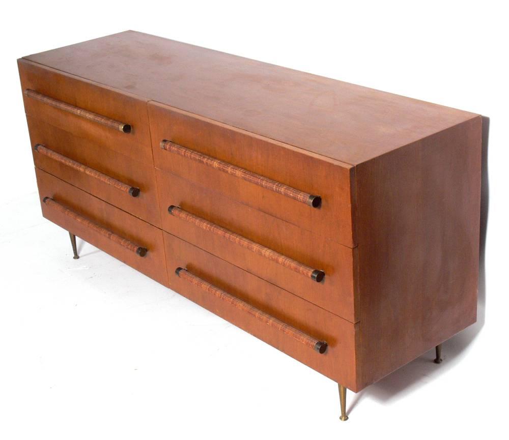 Elegant modern chest, designed by T.H. Robsjohn Gibbings for Widdicomb, American, circa 1950s. It is a versatile size and can be used as a chest or dresser in a bedroom, or as a storage piece in a living area. This piece is currently being