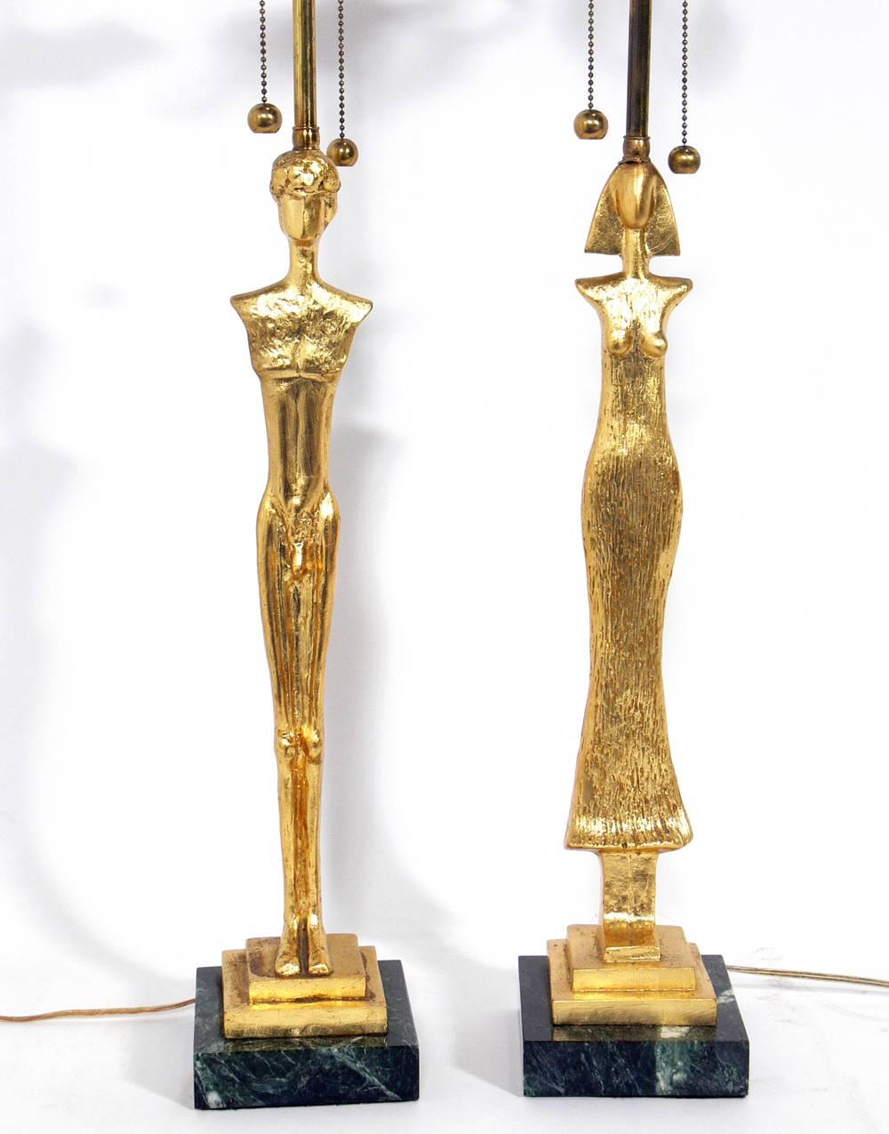 Pair of gilt metal figural lamps in the manner of Diego Giacometti, circa 2000s. The price noted below includes the shades.