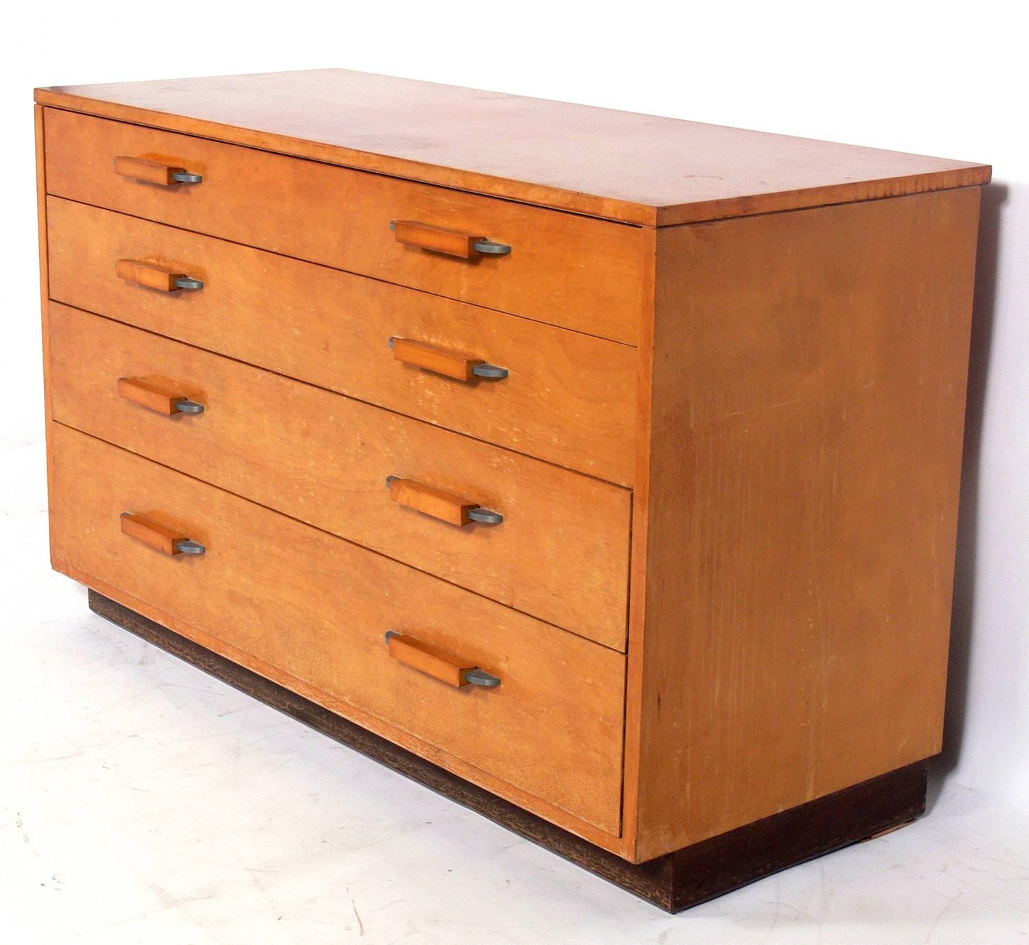 Modern birch dresser or chest, designed by Eliel Saarinen and his daughter Pipsan Saarinen Swanson for the Johnson Furniture Company, American, circa 1940s. 

In 1937 they designed these pieces as part of the 