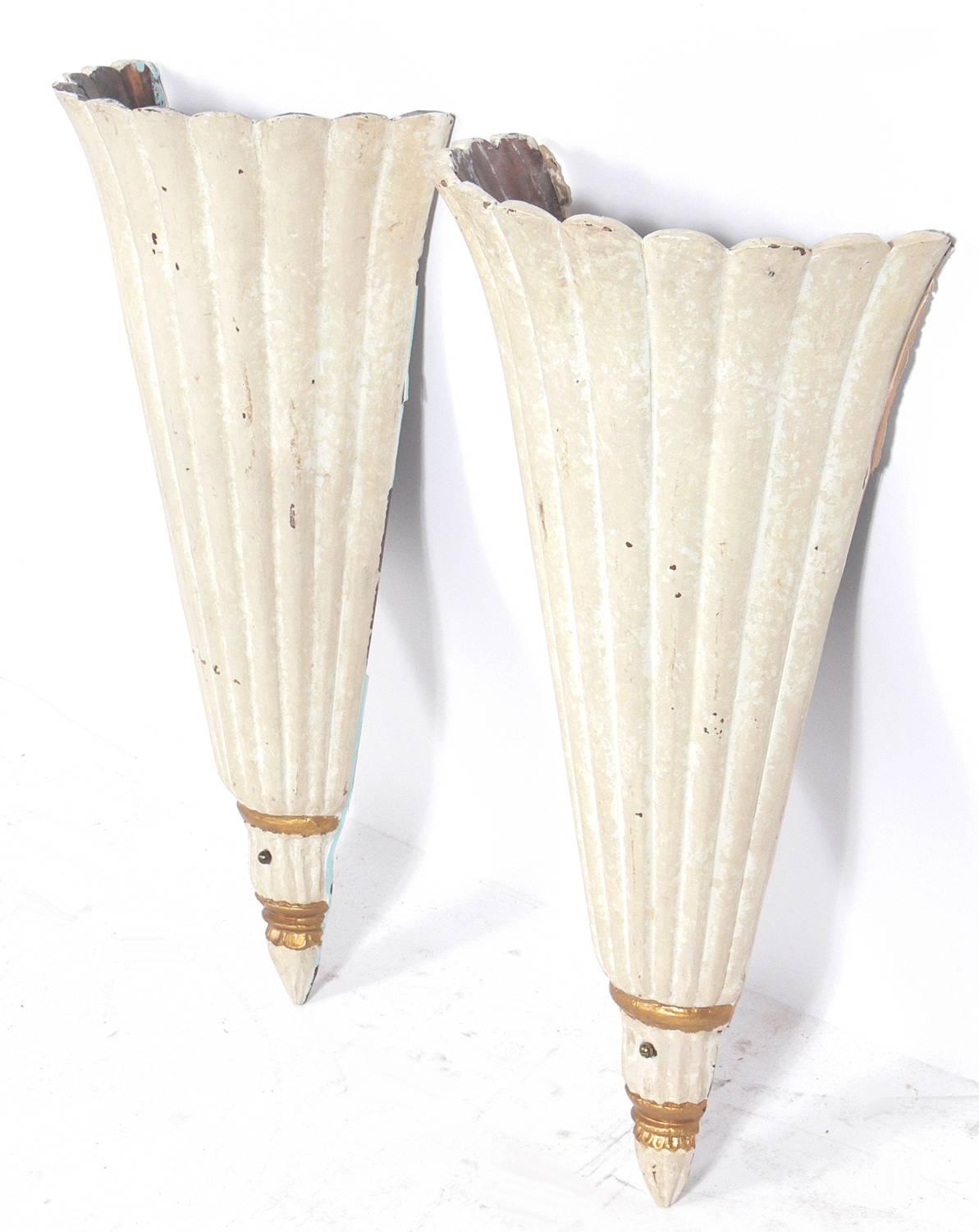 Pair of Italian painted wood sconces, Italy, at least circa 1930s, possibly earlier. They have been rewired and are ready to use. We have four pairs of these available. The price noted below is for one pair of sconces.